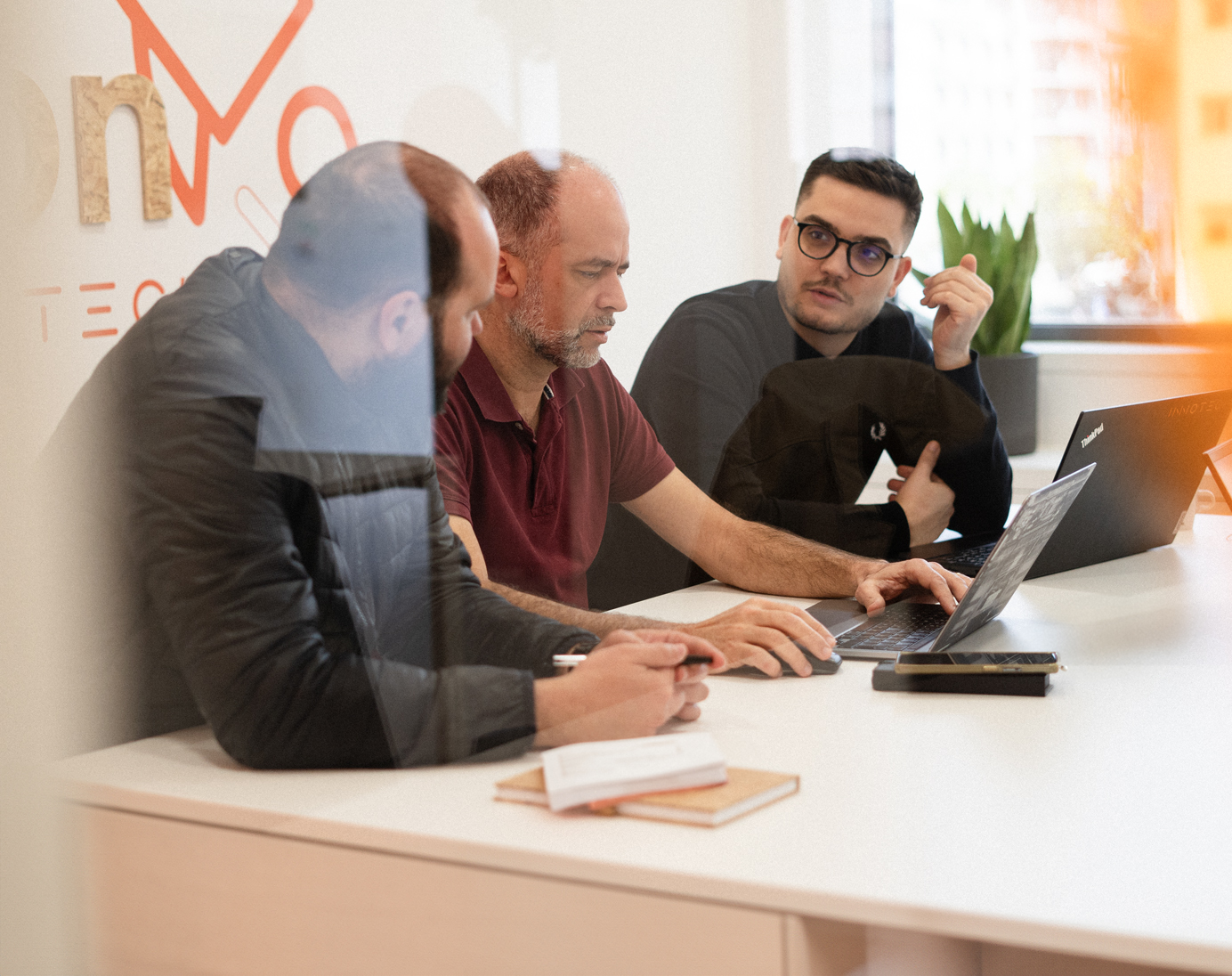 IT consultants working at InnoTech